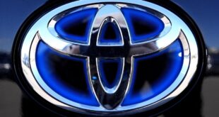 Scandal-hit car maker Toyota sees profits take a tumble