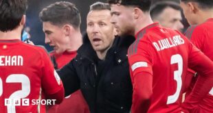 Craig Bellamy speaks to his Wales players