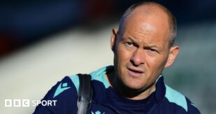 Alex Neil looks on during his time in charge of Stoke City