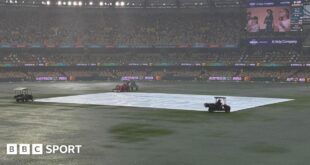 A general view of Gabba as the outfield is covered in puddles