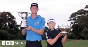 Ryggs Johnston and Shin Ji-yai with their winners trophies from the Australian Open