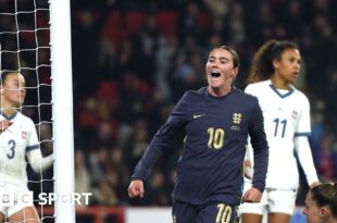 Grace Clinton celebrates scoring against Switzerland