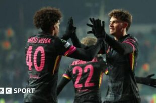 Chelsea players celebrate scoring against Astana