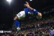 Ipswich Town's Omari Hutchinson celebrates his goal with a backflip