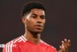 Manchester United forward Marcus Rashford claps fans