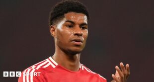 Manchester United forward Marcus Rashford claps fans