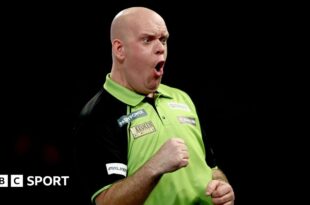 Michael van Gerwen shouts after winning a leg at the World Darts Championship