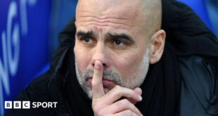 Pep Guardiola looks pensive