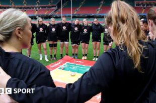 Wales women huddle at a captain's run