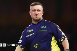 Luke Littler playing at the PDC World Darts Championship.