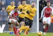 Wolves' Matt Doherty is fouled by Myles Lewis-Skelly, for which the Arsenal defender was sent off