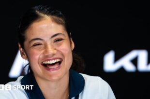 Emma Raducanu laughs during her pre-tournament news conference at the 2025 Australian Open