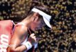 Emma Raducanu trudges off court after losing to Iga Swiatek at the Australian Open