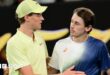 Jannik Sinner hugs Alex de Minaur after their Australian Open quarter-final