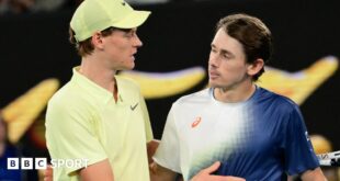 Jannik Sinner hugs Alex de Minaur after their Australian Open quarter-final