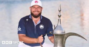 Tyrrell Hatton with the winners trophy