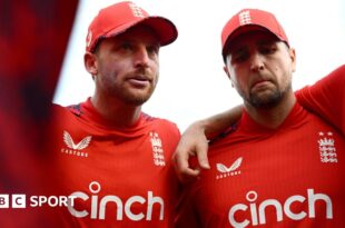 England captain Jos Buttler in a group huddle before an international match