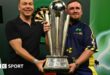 Luke Littler holding the Sid Waddell trophy alongside Sir Chris Hoy