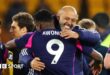 Nuno Espirito Santo celebrates Nottingham Forest's win with Taiwo Awoniyi.