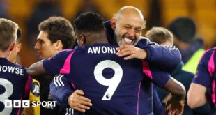 Nuno Espirito Santo celebrates Nottingham Forest's win with Taiwo Awoniyi.