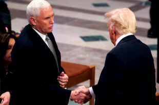 Obama and Trump share a warm moment as they and other past US presidents gather for Jimmy Carter