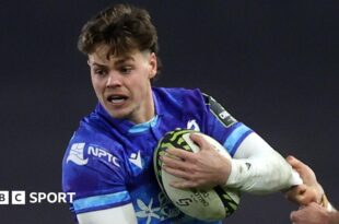 Jack Walsh attacks for Ospreys