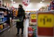 UK inflation dips, easing some pressure on government