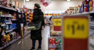 UK inflation dips, easing some pressure on government