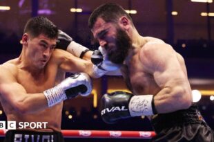 Dmitry Bivol punches Artur Beterbiev